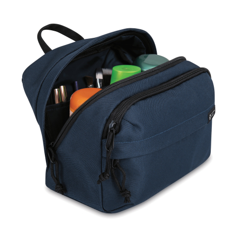 Vue intérieure de la trousse de toilette AWARE™ avec articles de voyage