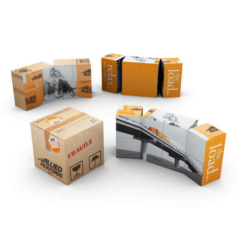 Cube promotionnel Allied Pickfords façon cartons, ouvertures variées, marquages visibles