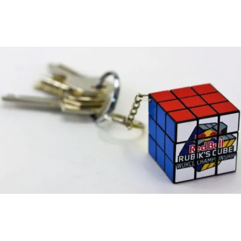 Mini Rubik’s Cube attaché à un porte-clés, faces colorées et logo visible