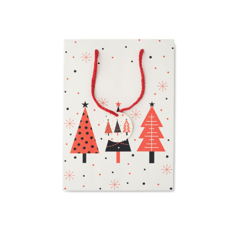 Sac cadeau moyen présenté de face, fond blanc à motifs festifs rouges et noirs