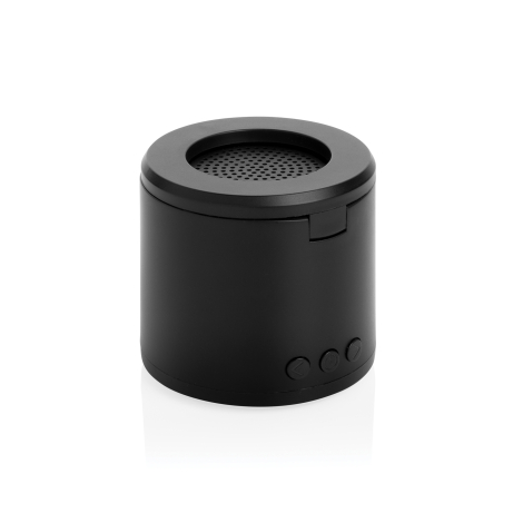 Enceinte noire vue de face avec grille circulaire et trois boutons visibles