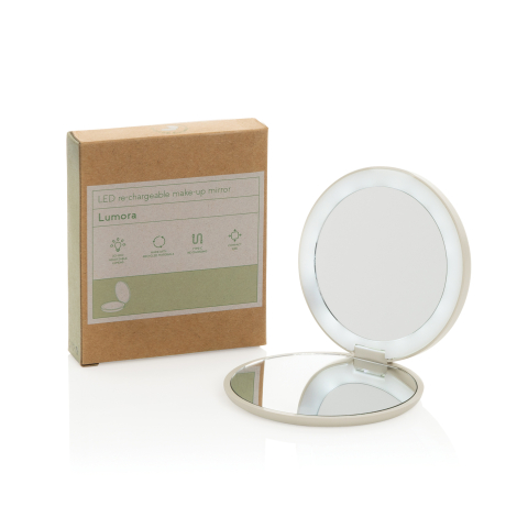 Miroir rond ouvert avec double surface et LED, posé à côté d’un étui en carton, sans marquage.