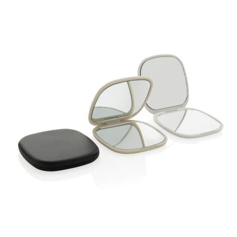 Trois miroirs de poche présentés ensemble, un noir fermé et deux ouverts beige et blanc, sans marquage.