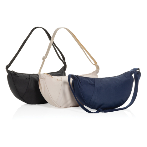 Trois sacs bandoulière en noir, beige et bleu marine présentés de trois quarts, sans marquage.