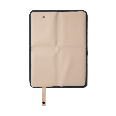 Coussin de pique-nique déplié en quatre panneaux intérieurs beige, sans marquage visible.