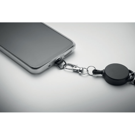 Cordon rétractable noir fixé à un smartphone via clip métallique, sans personnalisation.