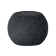 Enceinte sans fil ronde recouverte de tissu noir avec commandes intégrées sur le dessus, marquage visible.