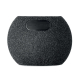 Vue arrière de l’enceinte ronde noire montrant l’interrupteur et le port de charge.