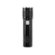 Lampe torche en aluminium noir vue de face avec bouton transparent au centre et lentille circulaire argentée.