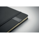 Gros plan sur un carnet A5 noir montrant le support latéral avec clé USB intégrée.