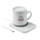 Chargeur à induction blanc rectangulaire avec surface circulaire grise et tasse blanche assortie posée dessus, marquage visible 