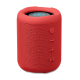 Enceinte cylindrique rouge en ABS avec grille en tissu et boutons latéraux, surface supérieure circulaire en plastique.