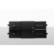 Coffret noir rectangulaire ouvert contenant la batterie externe avec anneau circulaire visible, sans marquage visible.
