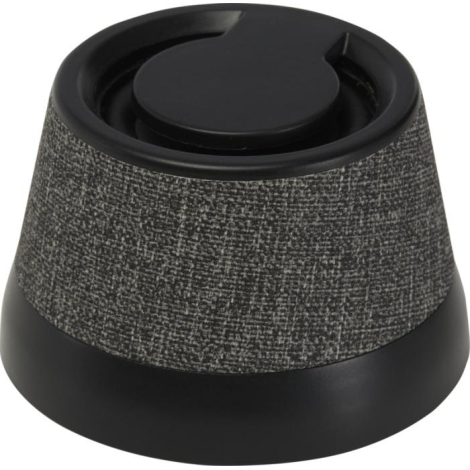 Enceinte vue du dessus avec couvercle noir circulaire au centre, sans marquage visible.