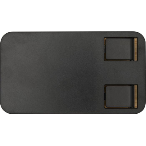 Vue rapprochée du panneau supérieur noir du support replié à plat, sans personnalisation visible.