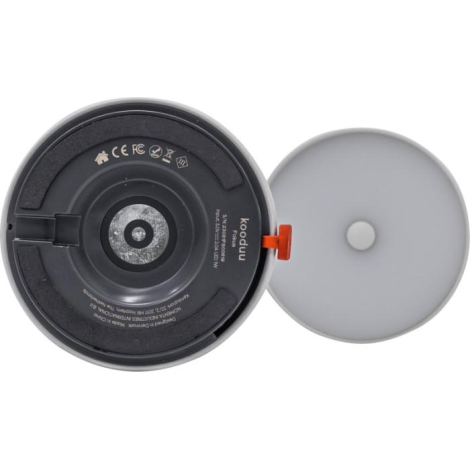 Vue inférieure d’une lampe montrant le socle circulaire et le couvercle retiré, sans personnalisation visible.