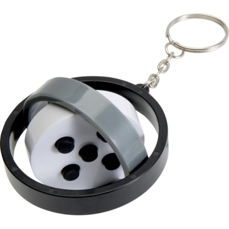 Porte-clés gyroscopique Spinx en plastique recyclé, élément intérieur mobile gris photographié en angle, sans marquage apparent.