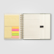 Carnet promotionnel ouvert montrant les notes adhésives, onglets et pages lignées. Carnet promotionnel ouvert montrant les notes adhésives, onglets et pages lignées.