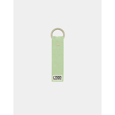 Porte-clés vert d'eau avec anneau doré et rivet central, marquage en bas