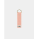 Porte-clés rose saumon avec anneau doré et rivet central, marquage en basv Porte-clés rose saumon avec anneau doré et rivet central, marquage en basv