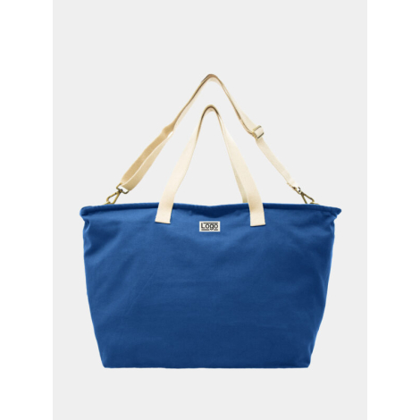 Sac week-end bleu roi avec anses écrues et bandoulière ajustable, marquage centré.