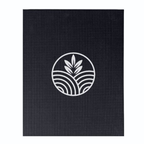 Couvercle du coffret noir présenté à plat, avec un marquage visible au centre.