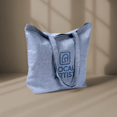 Sac tote-bag bleu à soufflets latéraux présenté debout, illustrant son volume généreux, avec un marquage visible sur la face ava