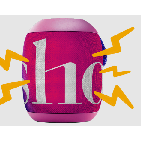 Vue rapprochée d’une enceinte montrant la surface textile tendue sur la partie centrale du cylindre, avec parties supérieure et 