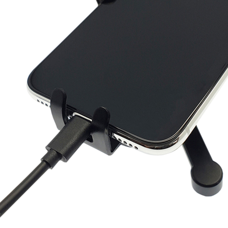 Zoom sur partie inférieure du support montrant zone de maintien et passage câble