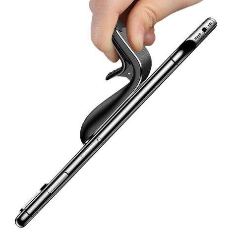 Support noir en gros plan tenu entre doigts montrant ouverture de la pince