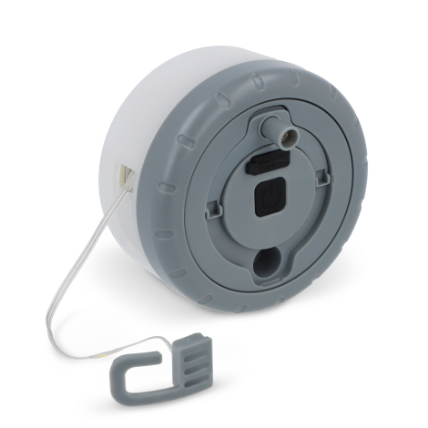 Vue du dessous du boîtier montrant la base grise avec bouton, connectique et crochet détachable, sans personnalisation visible.