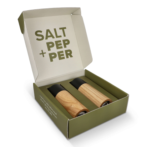 Les deux moulins disposés dans un coffret ouvert, posés dans leurs emplacements cartonnés, sans marquage apparent sur cette vue.