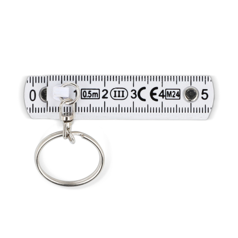 Segment du mètre déplié présentant une face graduée, sans personnalisation visible.