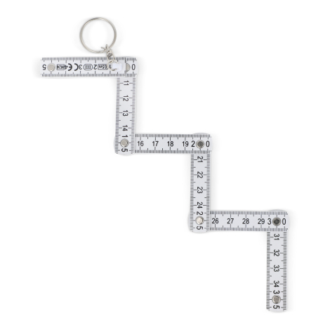 Mètre entièrement déplié illustrant l’autre face graduée, sans marquage apparent.