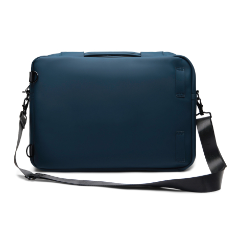 Sac convertible présenté de dos sur fond blanc, montrant une surface arrière lisse avec poignée supérieure intégrée et bandouliè