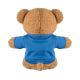 Peluche ourson présentée de dos sur fond blanc, de couleur marron clair, portant un t-shirt bleu dont l’arrière apparaît sans ma