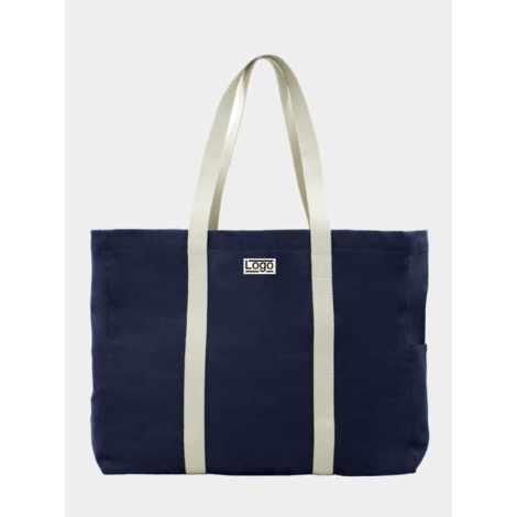Sac de plage bleu marine vu de face avec étiquette et marquage visible