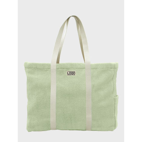 Sac de plage promotionnel personnalisable en coton bio éponge vert avec marquage visible centré sur la face avant.