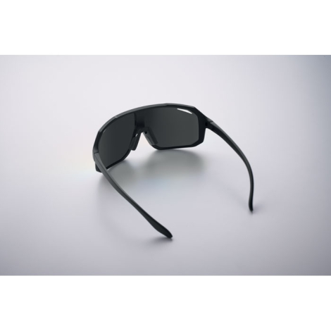 Vue arrière de lunettes de sport montrant l’intérieur de la monture et les deux branches ouvertes, sans personnalisation visible