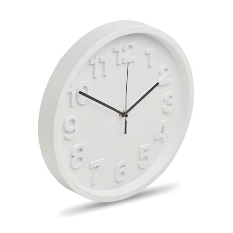 Présentée en perspective, l’horloge murale ronde blanche laisse apparaître l’épaisseur du cadre ainsi que les chiffres en relief