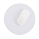 Tapis de souris rond vu côté verso, surface claire avec élément de support blanc fixé, sans marquage visible.