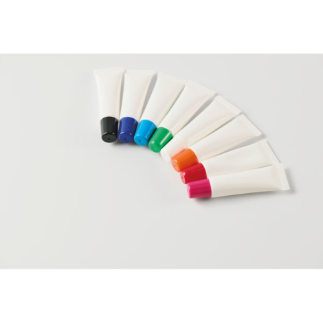 Ensemble de tubes de baume à lèvres disposés en éventail, montrant différents capuchons colorés, sans personnalisation visible.