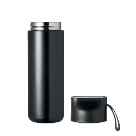 Bouteille à double paroi présentée debout avec le couvercle posé à côté sur fond neutre, sans marquage visible.