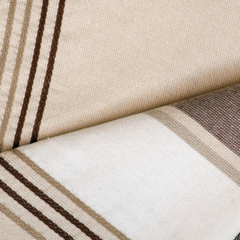 Gros plan sur tissu beige montrant texture jacquard et bandes tissées, aucune personnalisation apparente.