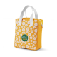 Sac isotherme jaune à motif floral blanc présenté fermé sur fond blanc avec poignées blanches et fermeture éclair sur le dessus,