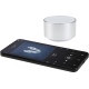 Enceinte cylindrique argentée positionnée à côté d’un smartphone affichant une interface musicale, sans personnalisation visible Enceinte cylindrique argentée positionnée à côté d’un smartphone affichant une interface musicale, sans personnalisation visible