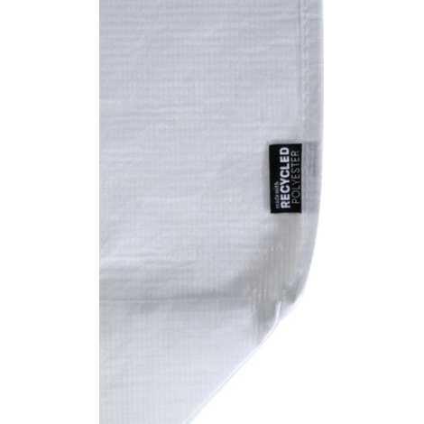 Vue rapprochée du côté d’un cabas blanc avec étiquette latérale, sans marquage visible.