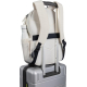 Vue arrière d’un sac à dos ordinateur beige fixé sur la poignée télescopique d’une valise, montrant bretelles et panneau dorsal, Vue arrière d’un sac à dos ordinateur beige fixé sur la poignée télescopique d’une valise, montrant bretelles et panneau dorsal,