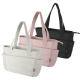 Trois sacs cabas matelassés présentés de face en différentes couleurs avec anses longues, sans marquage visible.
