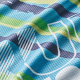 Gros plan sur un tissu quadrillé avec un visuel imprimé multicolore. Gros plan sur un tissu quadrillé avec un visuel imprimé multicolore.